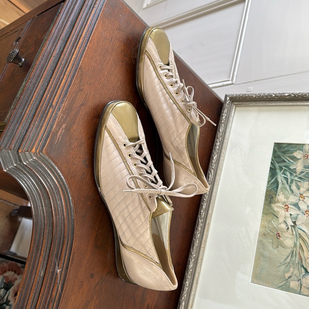 Amalfi by Rangoni 
Narrow gold and taupe flats